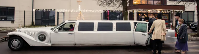 The limousine that collects the guests
