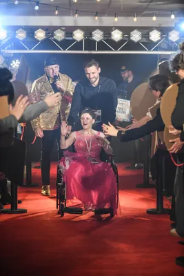 A guest arrives on the red carpet